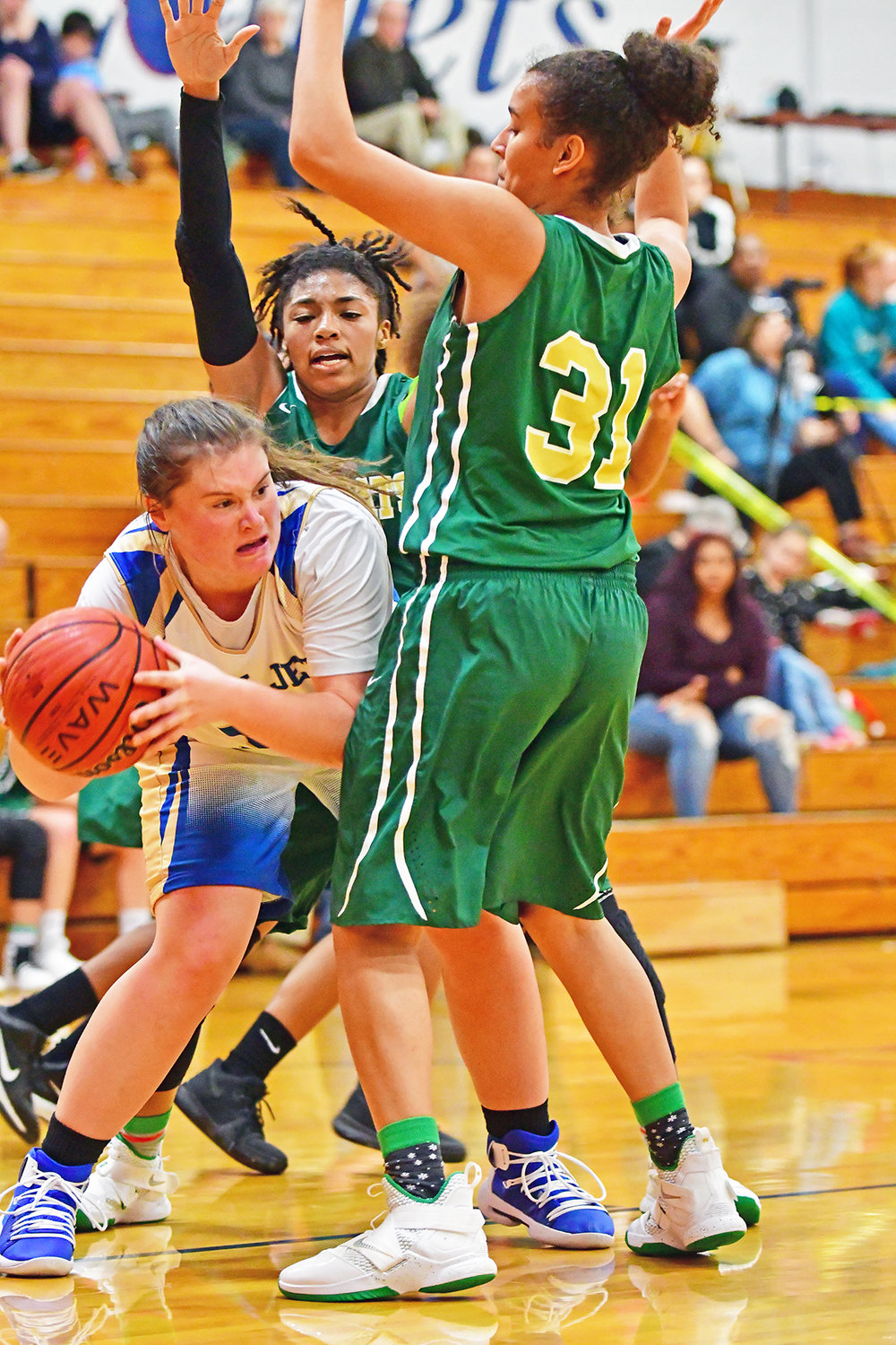 Lady Jet Jocelyn Mitchell looks for a way to pass the ball around the Eastern Randolph's defense.