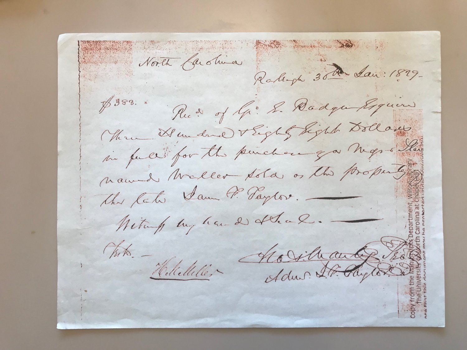 The Bill of Sale documenting the purchase of Waller, Lewis Freeman's son, from the estate of James Taylor in 1829 in Raleigh by Judge George Badger. The price was $388. .Badger later became a Cabinet member in 1842 under President Harrison.
