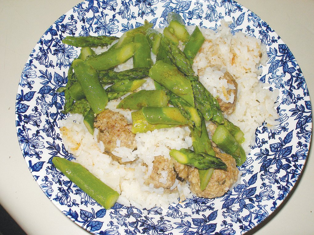 Coconut Rice Meatballs with Sauteed Asparagus.
