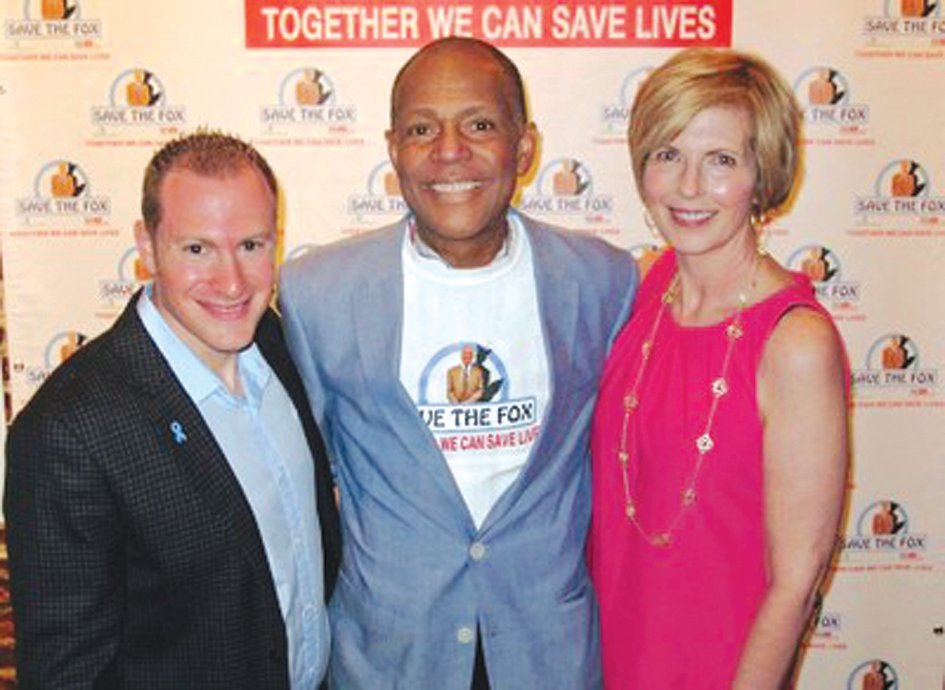Judge Carl Fox, center, announced he will retire on Oct. 1. Fox has battled bone cancer, inspiring 'Save the Fox' which encourages people to register to be a bone marrow match, especially minorities. In this picture, Fox poses with Joshua F. Zeidner, MD (left) and Fox's wife, Julia Kemp Fox (right) at a fundraiser to raise awareness for the cause.
