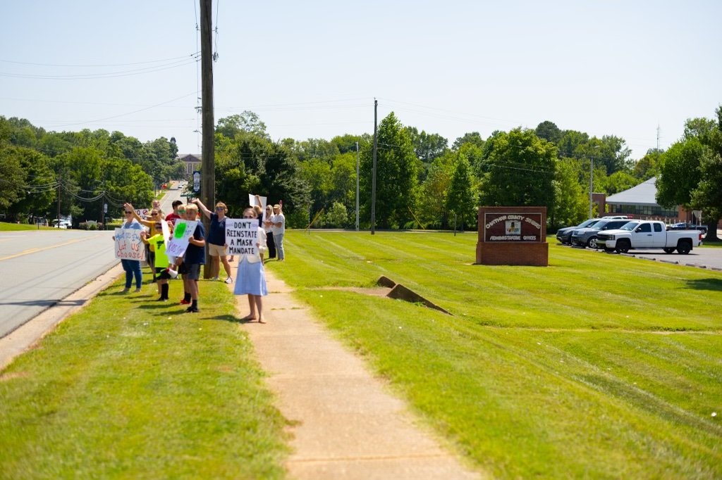Parents gathered at a "Parent's Choice 4 Masks Rally" outside of the Chatham County Schools Board of Education's specially called meeting in August.