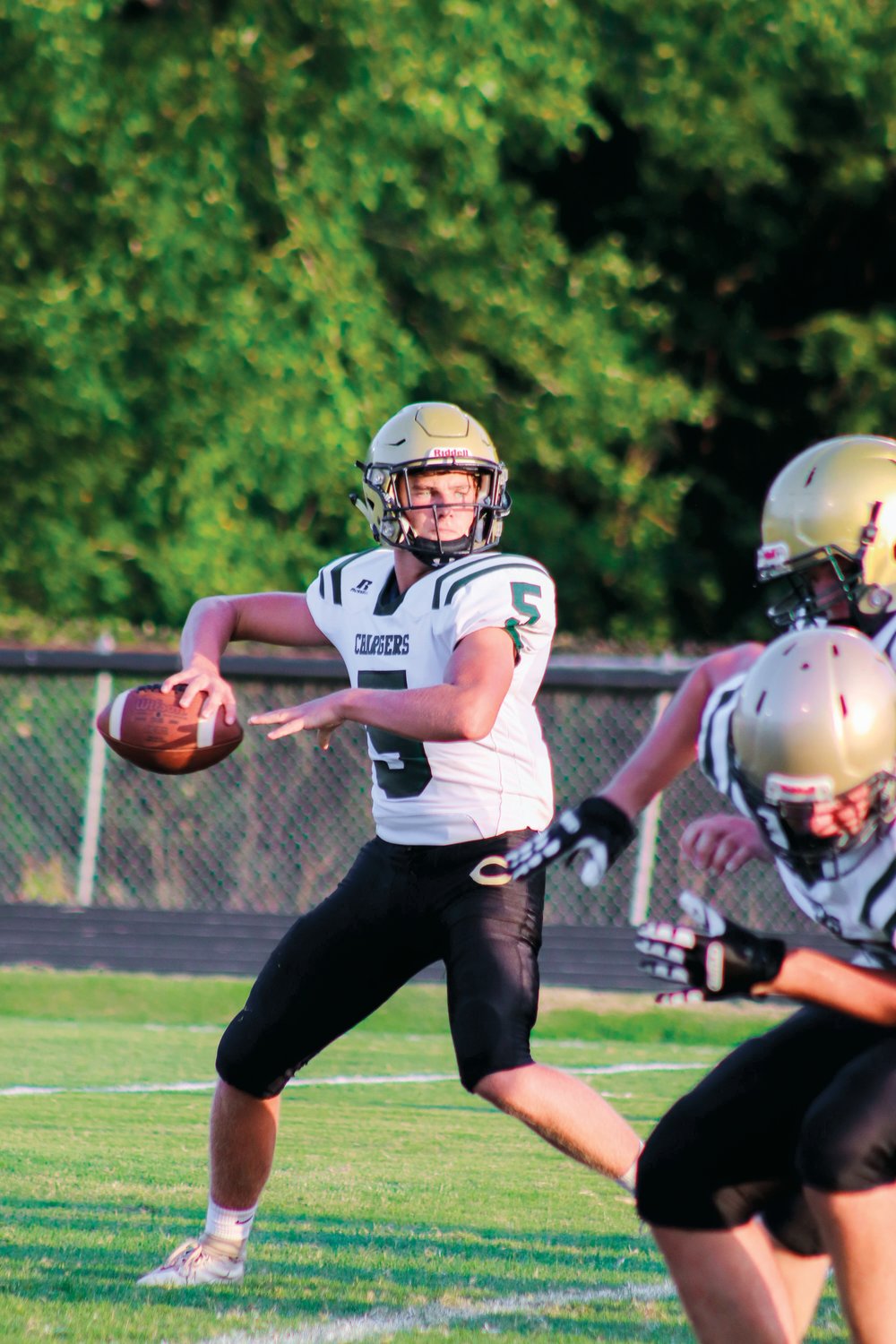 Northwood sophomore quarterback Carson Fortunes steps back to throw during the first half of the Chargers' 72-0 victory over Jordan-Matthews last Friday. Fortunes threw three passes on the night, each of which went for touchdowns.