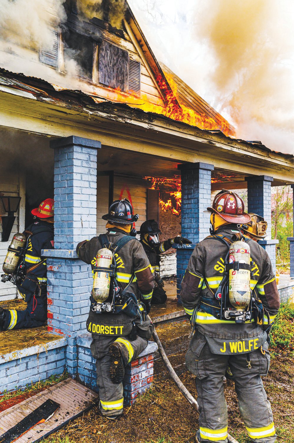 Members of the Siler City Fire Department take part in a practice burn earlier this year.