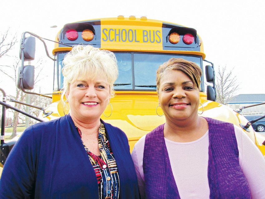 Bus driver positions are one most impacted by staffing shortages this year. Pictured here from February 2019 are Beverly Fox and Joanne Tyson, who shared the route for bus No. 72 at Silk Hope School, where they both still work.