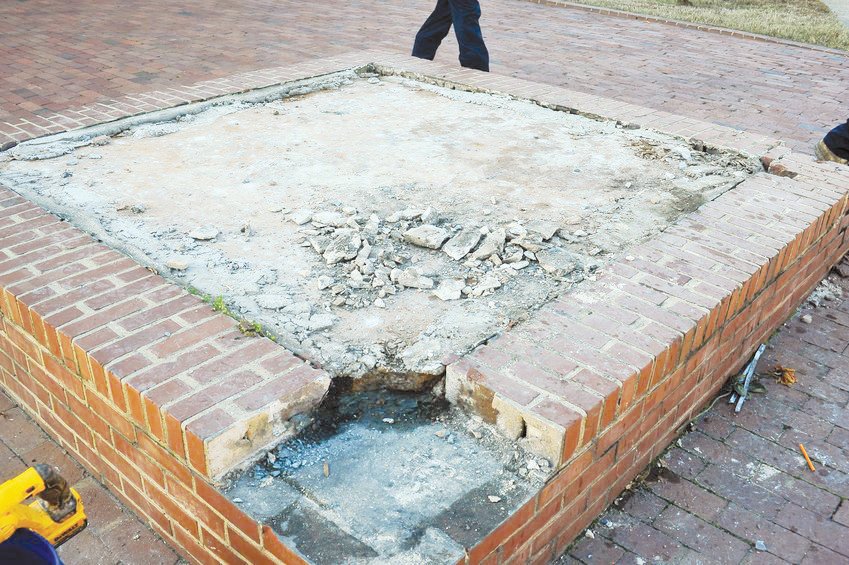 On the morning after its removal in November 2019, these were the remains of the former home of the Confederate monument on the grounds of the historic Chatham County Courthouse.