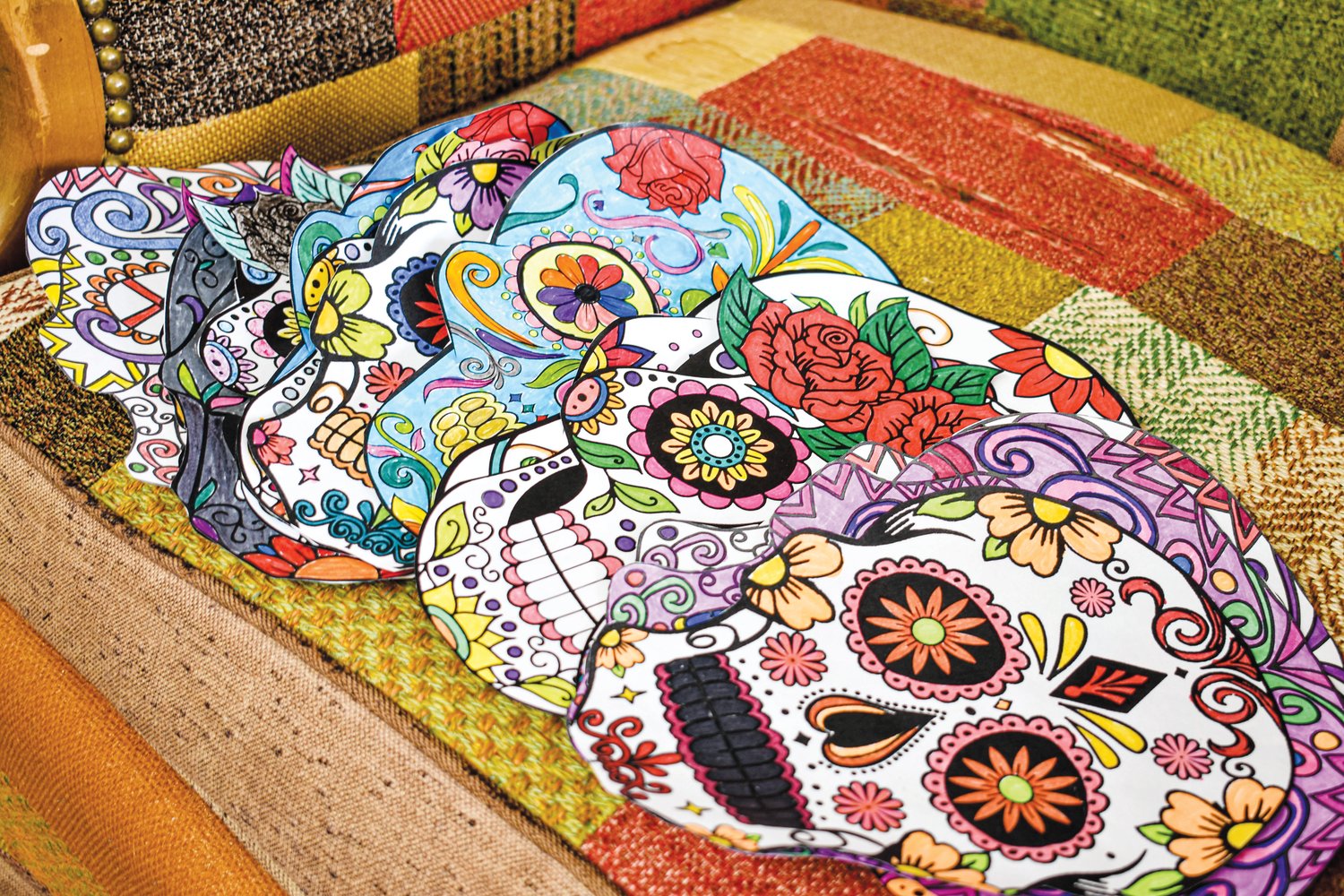 CIS youth, staff and parents colored in these skulls, or 'calaveras' in Spanish, which represent deceased relatives in traditional Day of the Dead iconography.