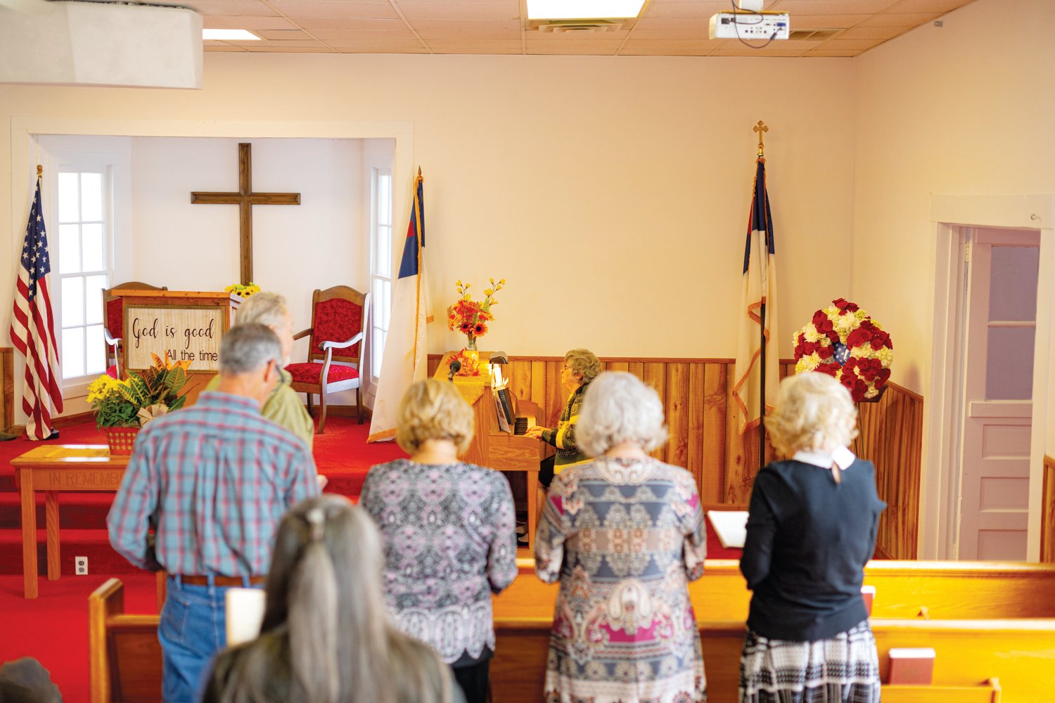Members of Pleasant Hill Baptist Church sing a hymn together during Sunday's worship service.