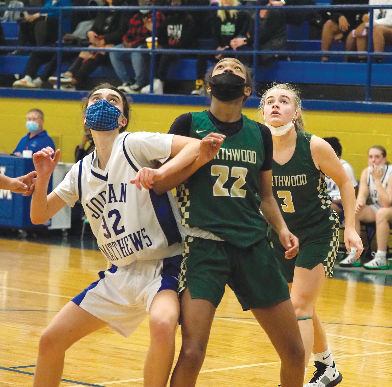 Jordan-Matthews junior Maggie Thornton (32) boxes out Northwood sophomore Skylar Adams (22) in the Chargers' 61-21 win over the Jets last Wednesday in Siler City.