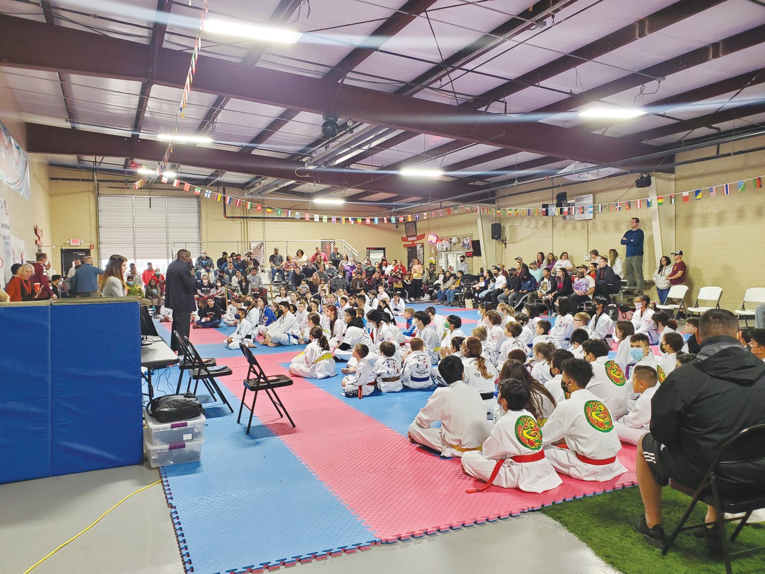 Competitors gather on the mat at A.F.E. Taekwondo in Siler City ahead of the 2021 AFE Winter Games, which featured over 135 participants competing in three event styles.