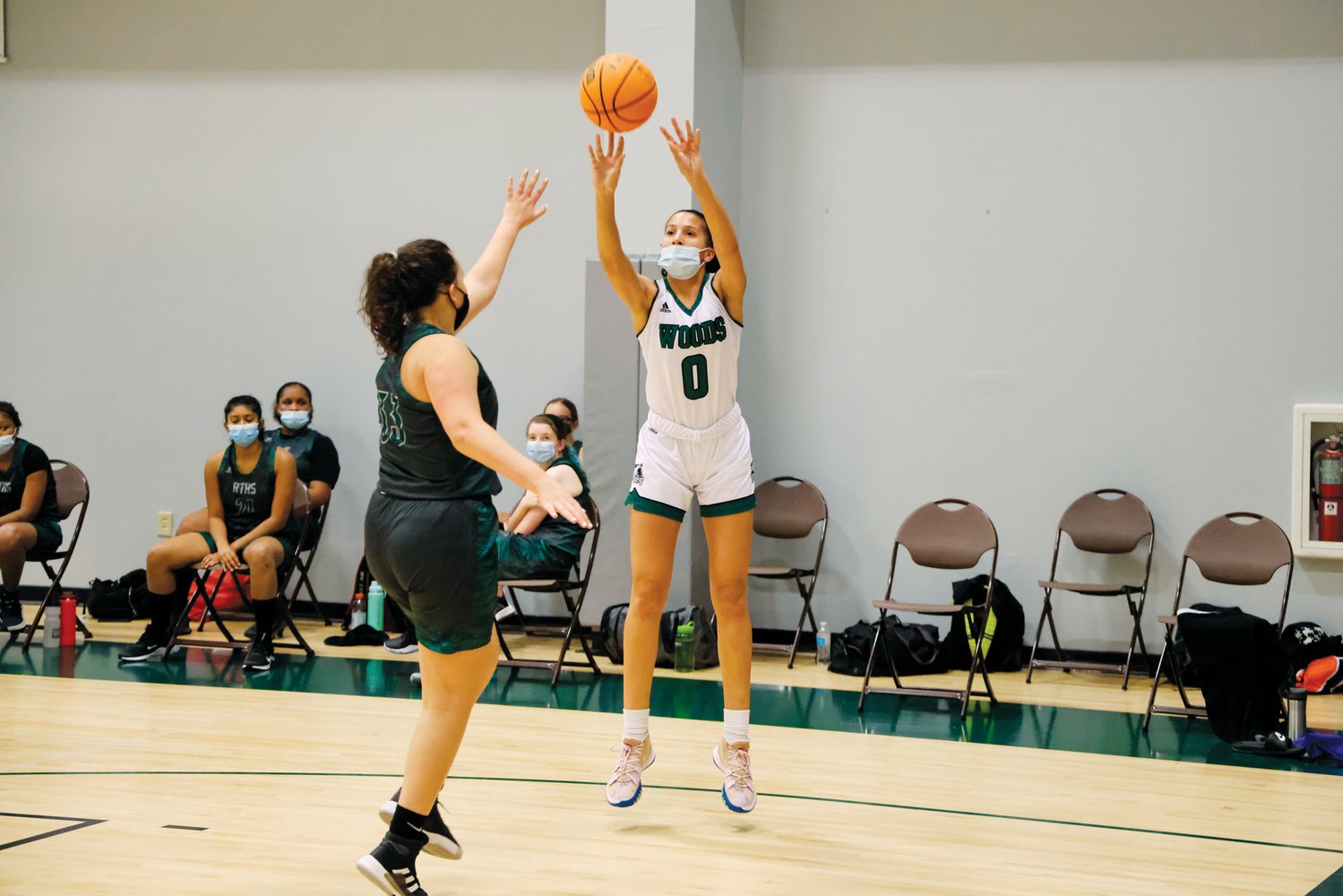Woods Charter sophomore Lexi Smollen (0) shoots a jumper in the Wolves' 53-11 win over Research Triangle in Chapel Hill last Friday. Smollen is the team's leading scorer on the season, averaging 15.3 points per game.