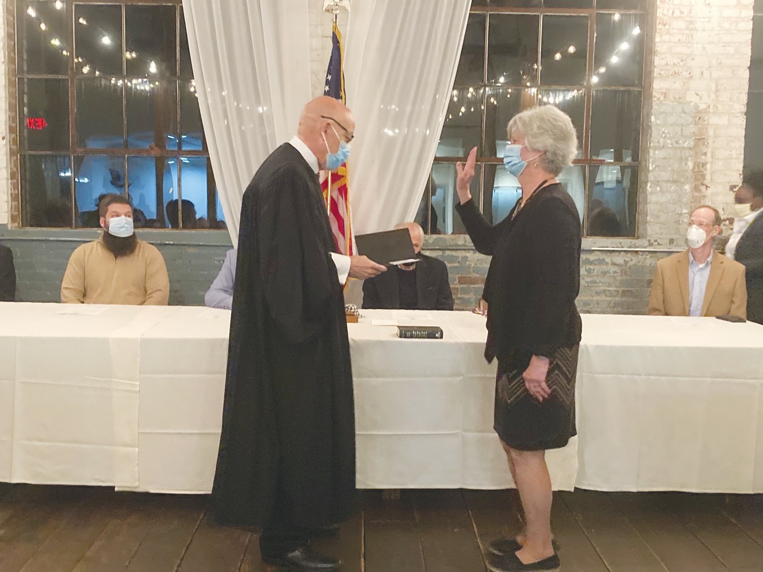 Pittsboro Mayor Cindy Perry is sworn in by Judge Joe L. Webster on Monday.