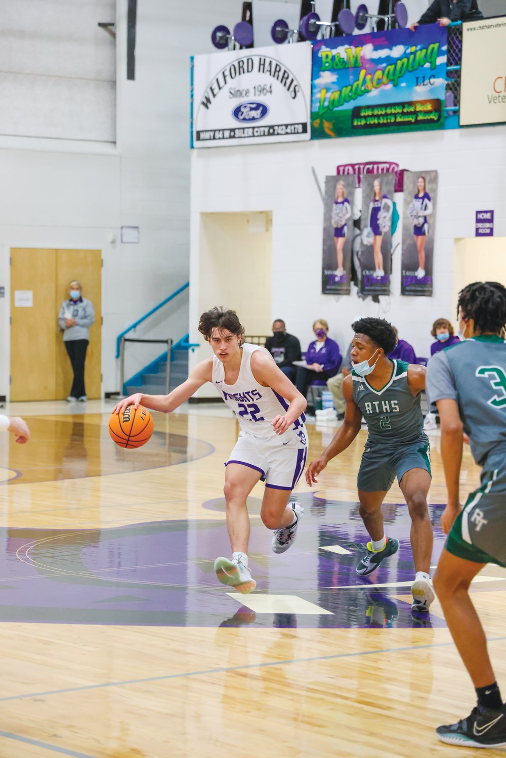 Chatham Charter freshman Beau Harvey (22) works to break the infamous Research Triangle trap defense in the Knights' 60-59 win over the Raptors in the championship game of the 2021 Chatham Charter Winter Slam last Wednesday. Harvey was named the tournament's Most Outstanding Player.
