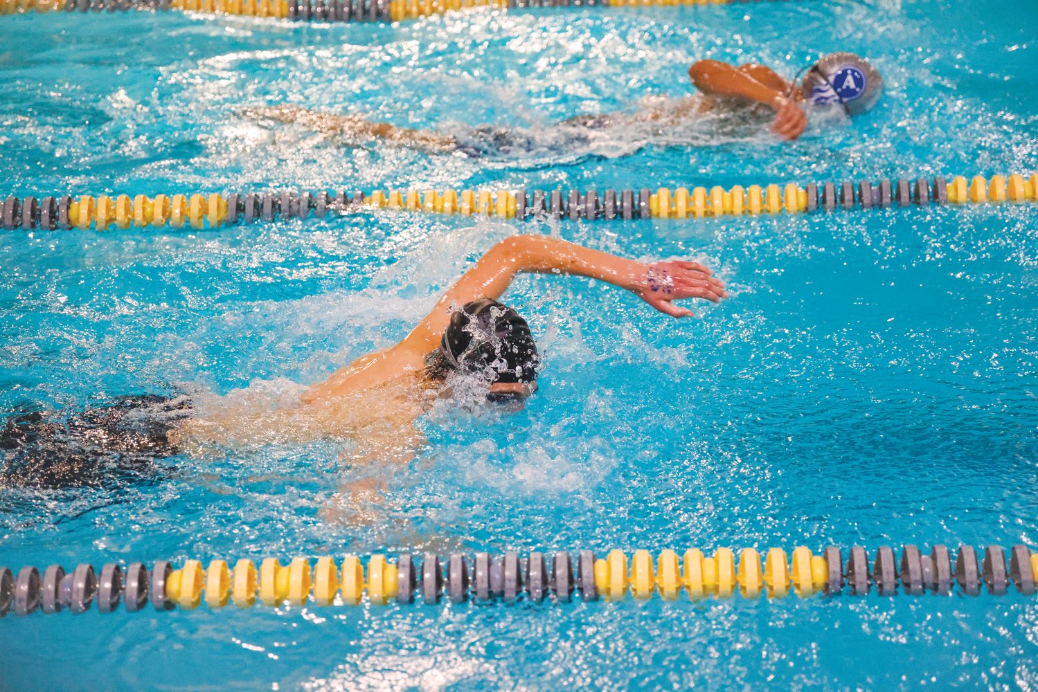 Jordan-Matthews junior Calvin Conroy slices through the water in one of his freestyle events at a swim meet in Asheboro last Thursday. Conroy placed 7th (3:55.77) and 9th (1:47.29) in the 200-meter freestyle and 100-meter freestyle, respectively.
