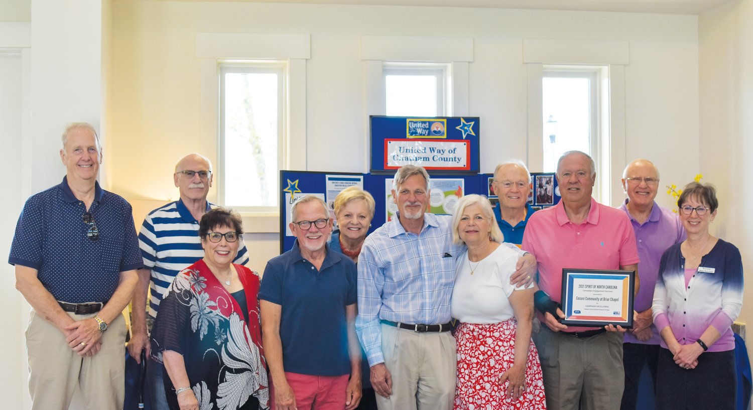 The captains for Encore at Briar Chapel's campaign, which helped the United Way gain more than 100 new donors. Pictured, from left, are Gary LaMar, Stu Rothman, Lisa Rothman, Roscoe McWilliams, Donna Buckley, Jeff York, Melanie York, Bill Buckley, John Hughes, Dave Mirkovich and Mary Ann Hale.