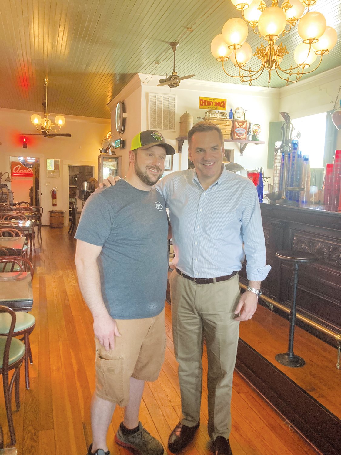 Congressman Richard Hudson Jr. (right) stands with S&T Soda Shoppe co-owner T.J. Oldham.