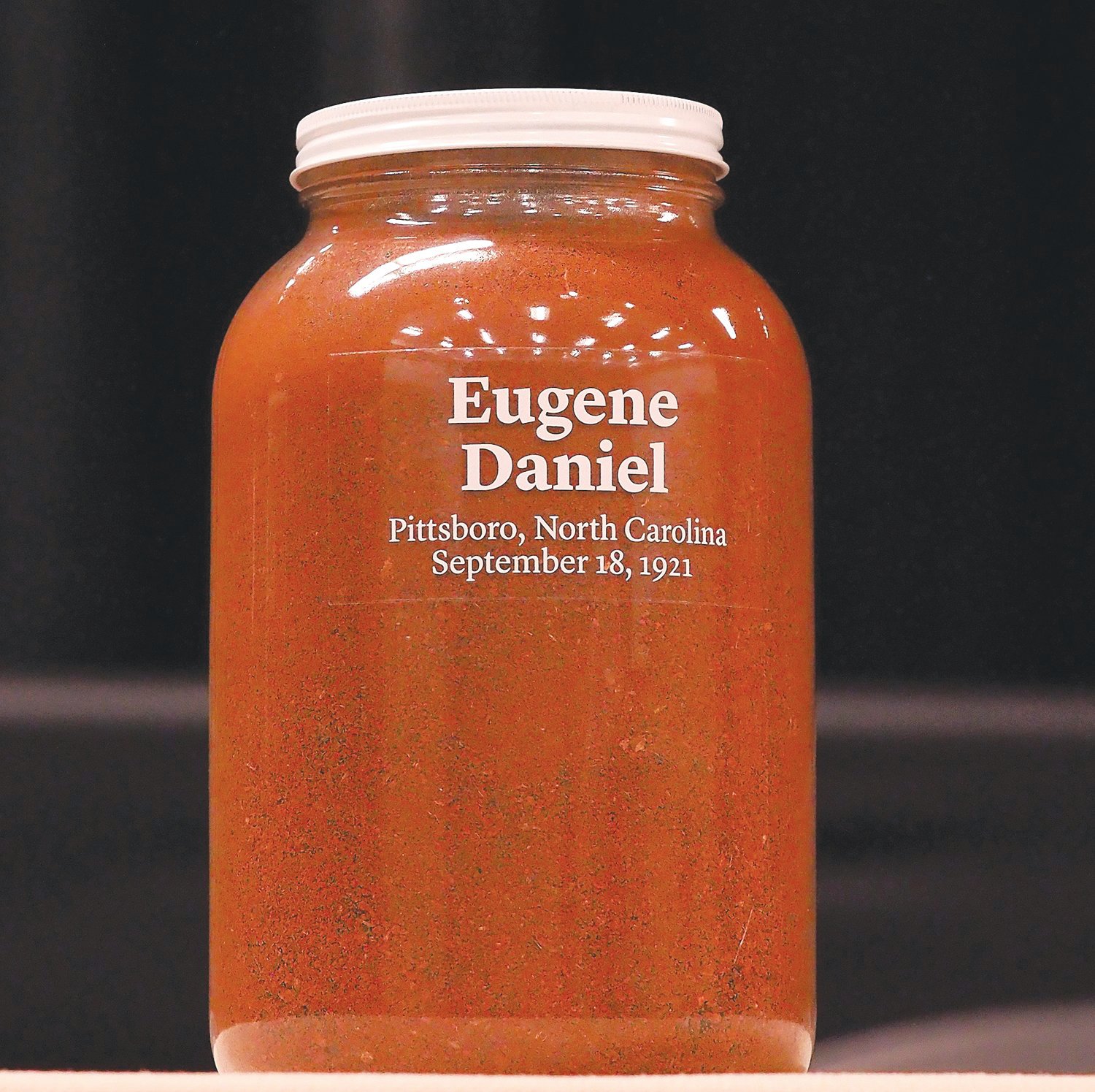 This jar of soil, from Eugene Daniel's lynching site, is now on display at the Equal Justice Initiative's Legacy Museum in Montgomery, Alabama. Another soil removal ceremony coincides with an event memorializing Chatham's other lynching victims on May 14.