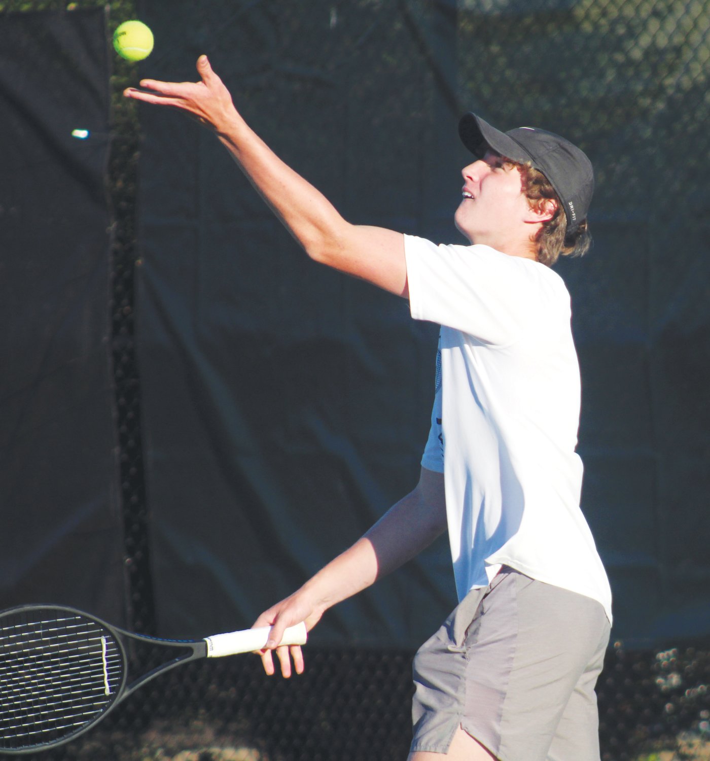 Chatham Central sophomore Jacob Gilliland prepares to serve in his doubles match against Clover Garden's Will Oldham/Blake Foley on Monday.