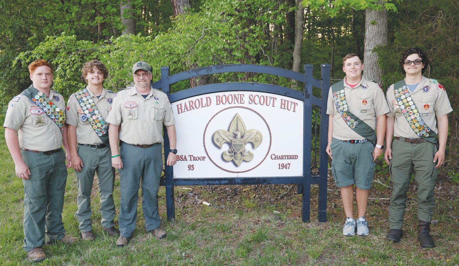 Soon-to-be Eagle Scouts, from left: Logan Quinlan, Andrew Trotter, Scoutmaster David Lorbacher, Peter Droese and Anthony Trotter. Each of the Troop 93 members will receive his Eagle certification in a ceremony on May 21.