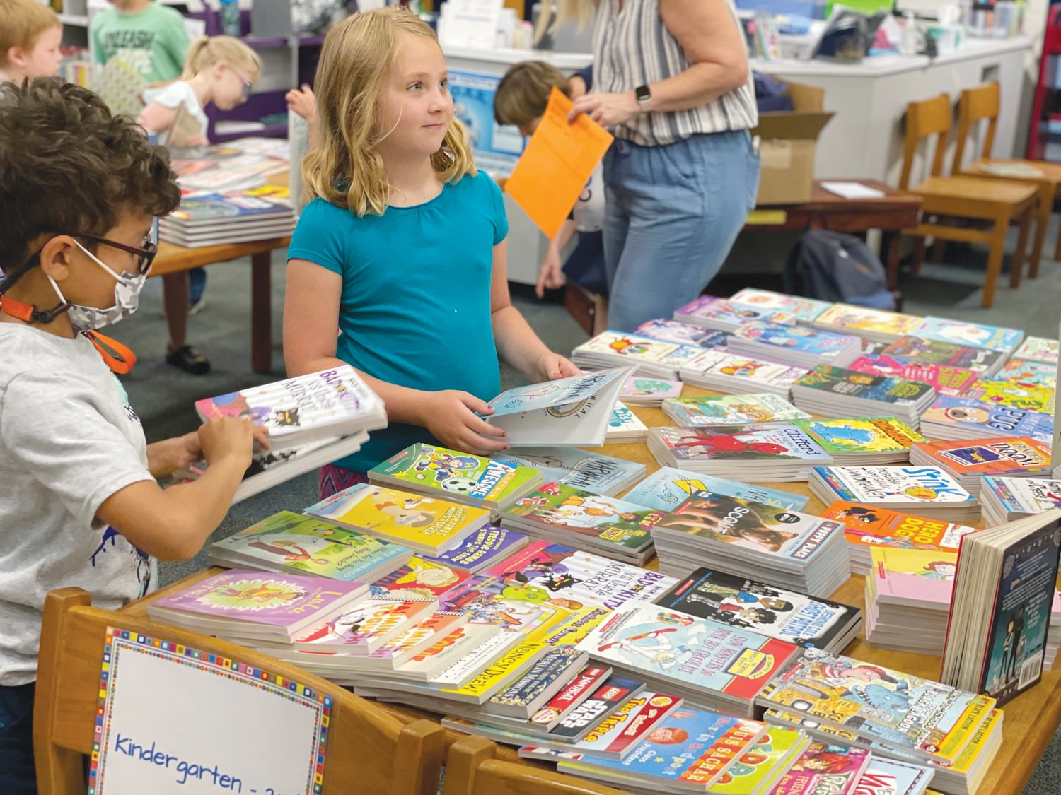Kingergarten students at Silk Hope School in Siler City pick out new books as part of Chatham Education Foundation's Books on Break program. The event reaches more than 2,000 students at five schools across the county.