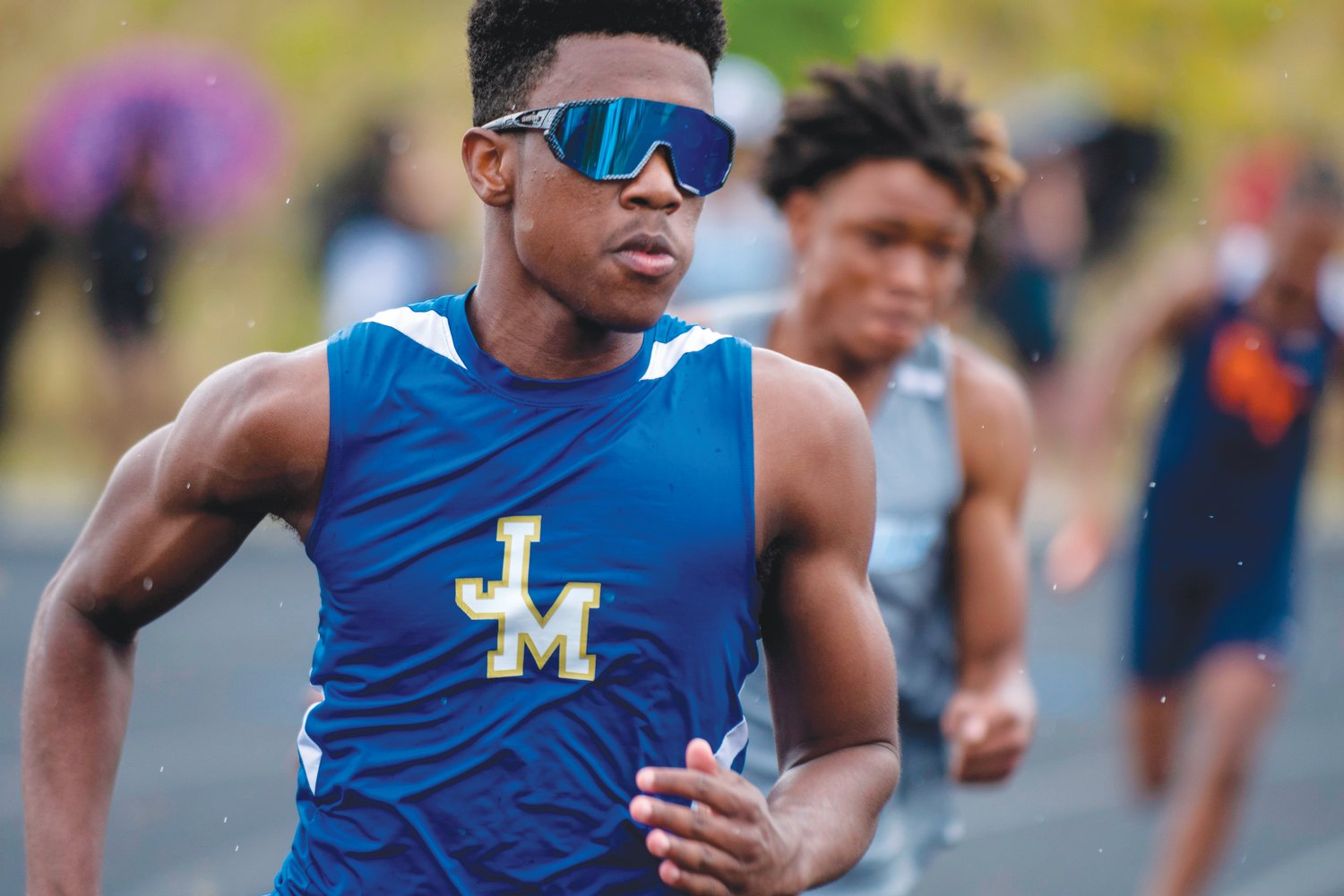 Jordan-Matthews freshman Dwight Headen competes in the men's 4x200-meter relay in the NCHSAA 2A Mideast Regionals in Franklinton on Saturday. The Jets' men's team earned three medals in the meet.
