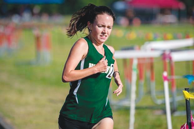 Northwood senior Caroline Murrell, the defending 3A state champion in the women's 3,200-meter race, takes part in one of her two solo distance runs at the NCHSAA 1A Mideast Regionals at Franklinton High School last Saturday. Murrell captured first in the women's 3,200-meter run and second in the 1,600-meter.