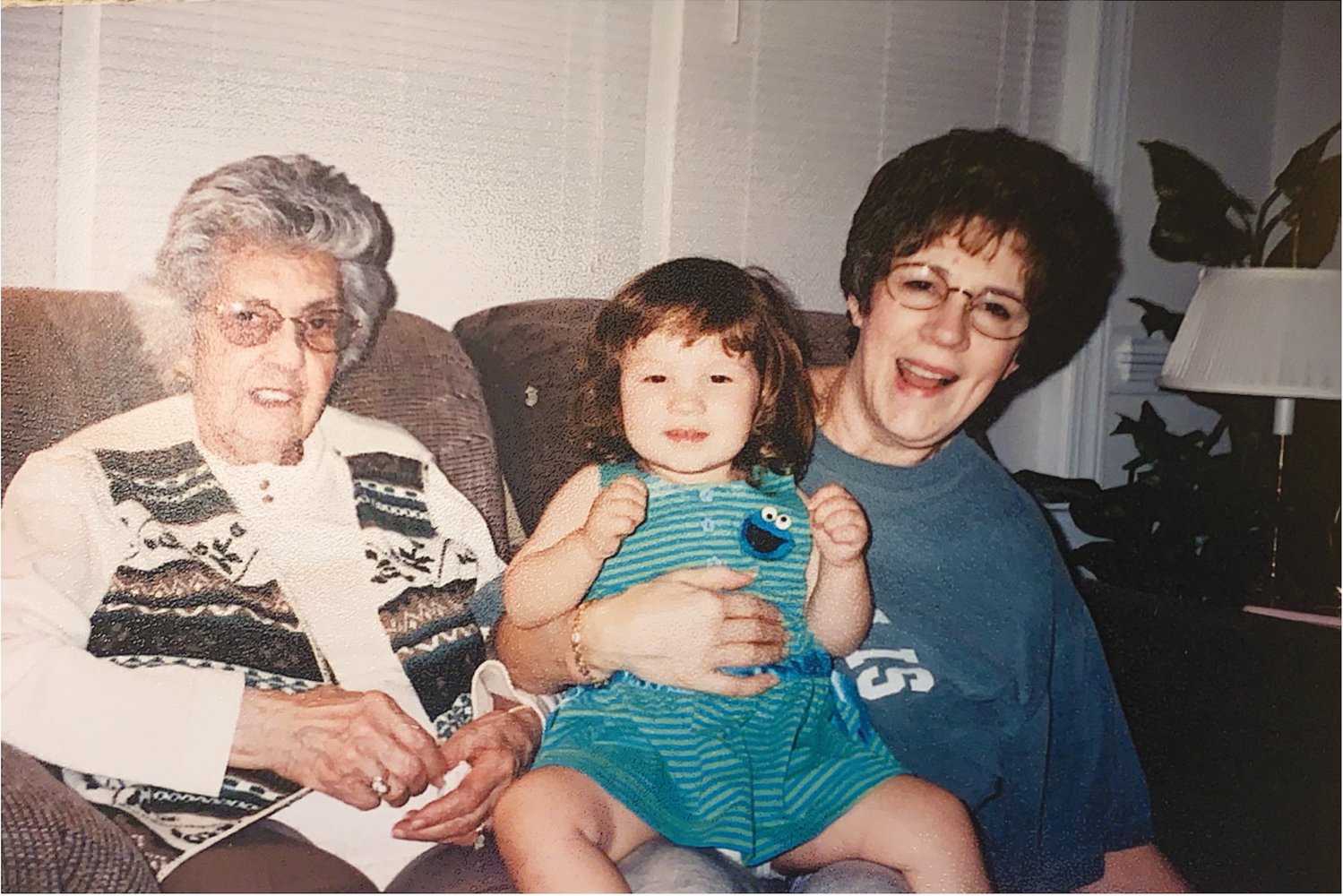 Taylor Heeden (middle) sitting with her great-grandmother (left) and her grandmother (right).
