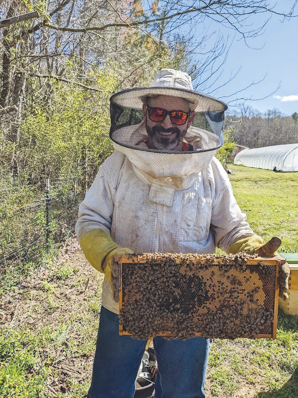 Erik Stevens, co-owner and beekeeper at Three Dog Apiary.
