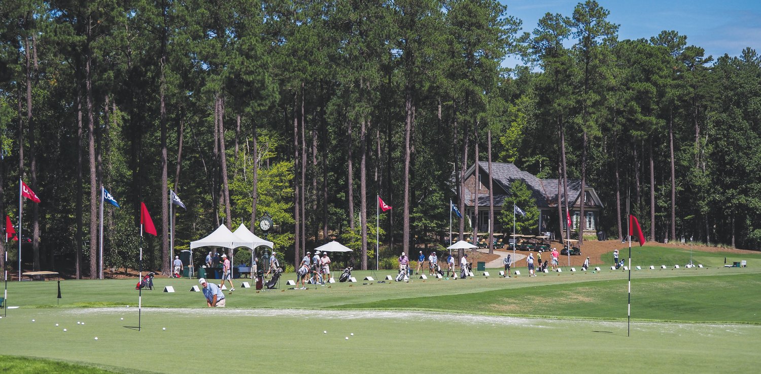 Competitors get in their practice swings during the 2019 U.S. Senior Amateur at Old Chatham Golf Club in Durham.