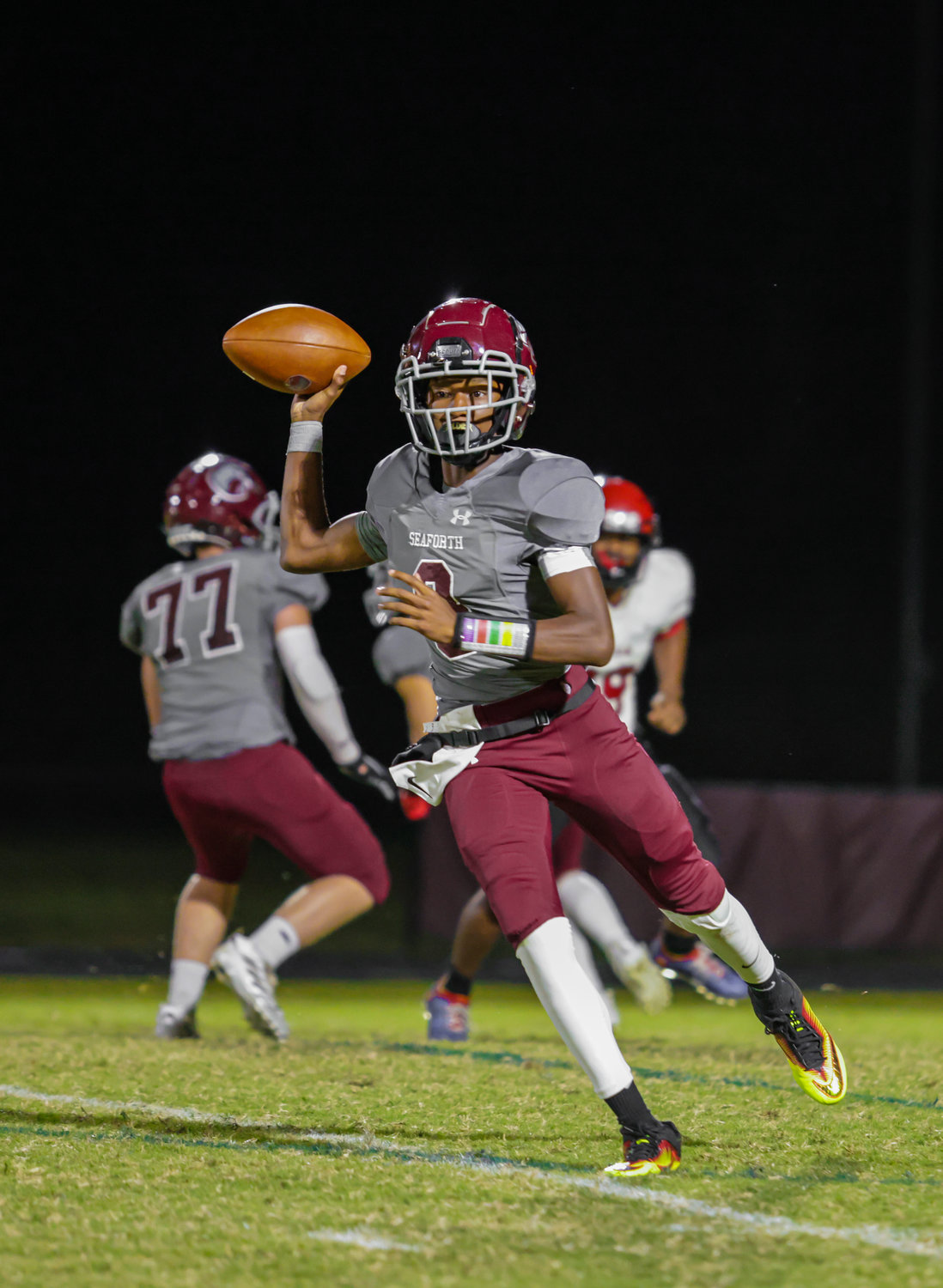 Seaforth sophomore quarterback Joshua Brown attempts a pass during the Hawks' 20-12 loss to Graham High on Friday.