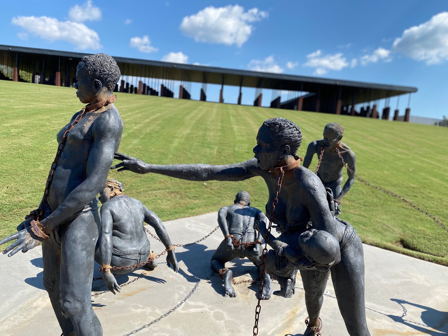 This artistic creation by Kwame Akoto-Bamfo depicts the bondage of slavery. This is part of the National Memorial for Peace and Justice, a six-acre reflection site in Montgomery.