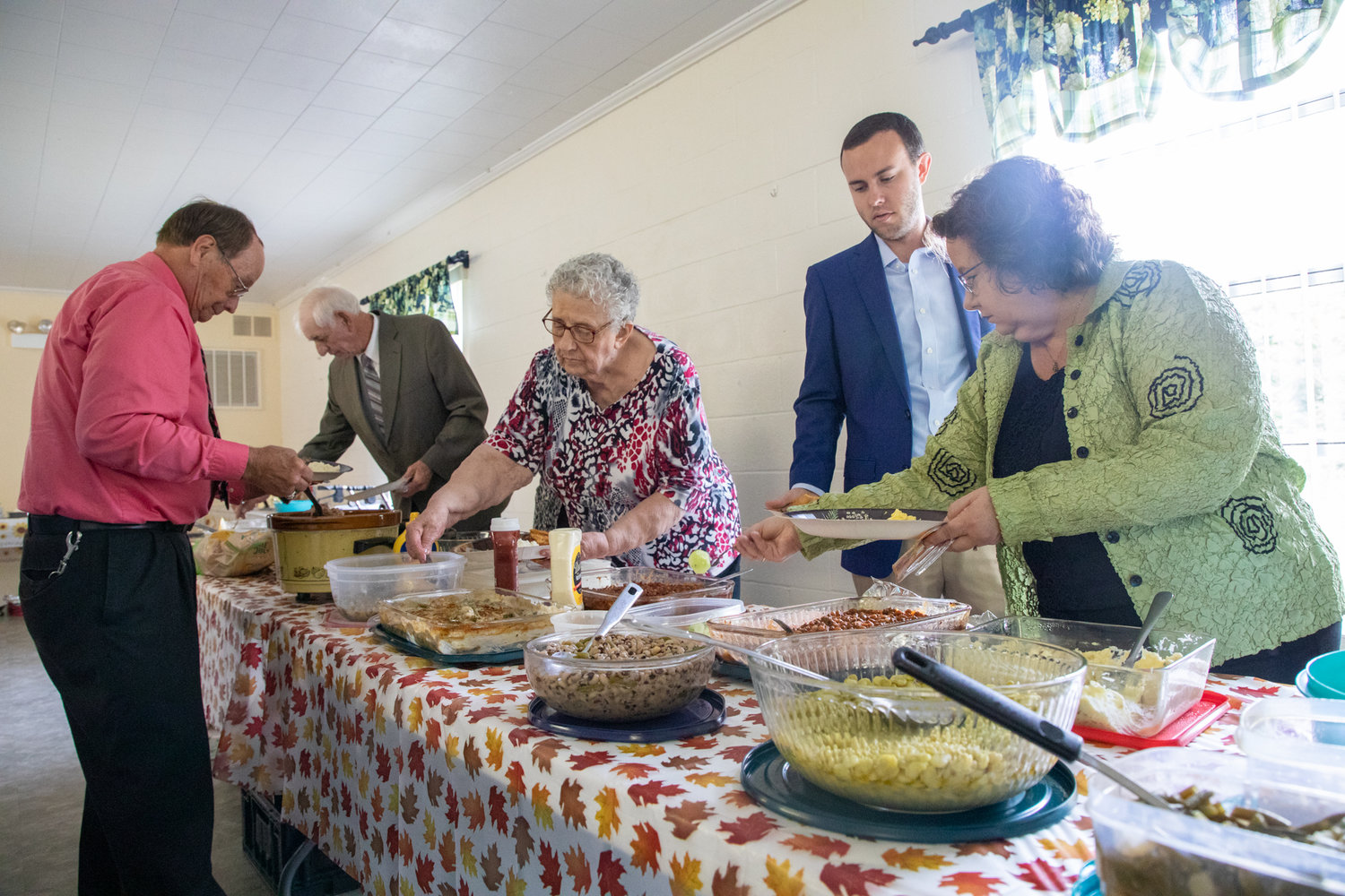 Members of Merry Oaks Baptist Church and their loved ones share in a Homecoming meal following the church service on Sept. 25.
