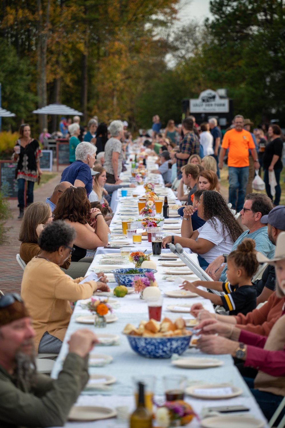 Chatham residents gather for a pay-what-you-can community feast at The Plant hosted by the Quiltmaker Café on Oct. 16.