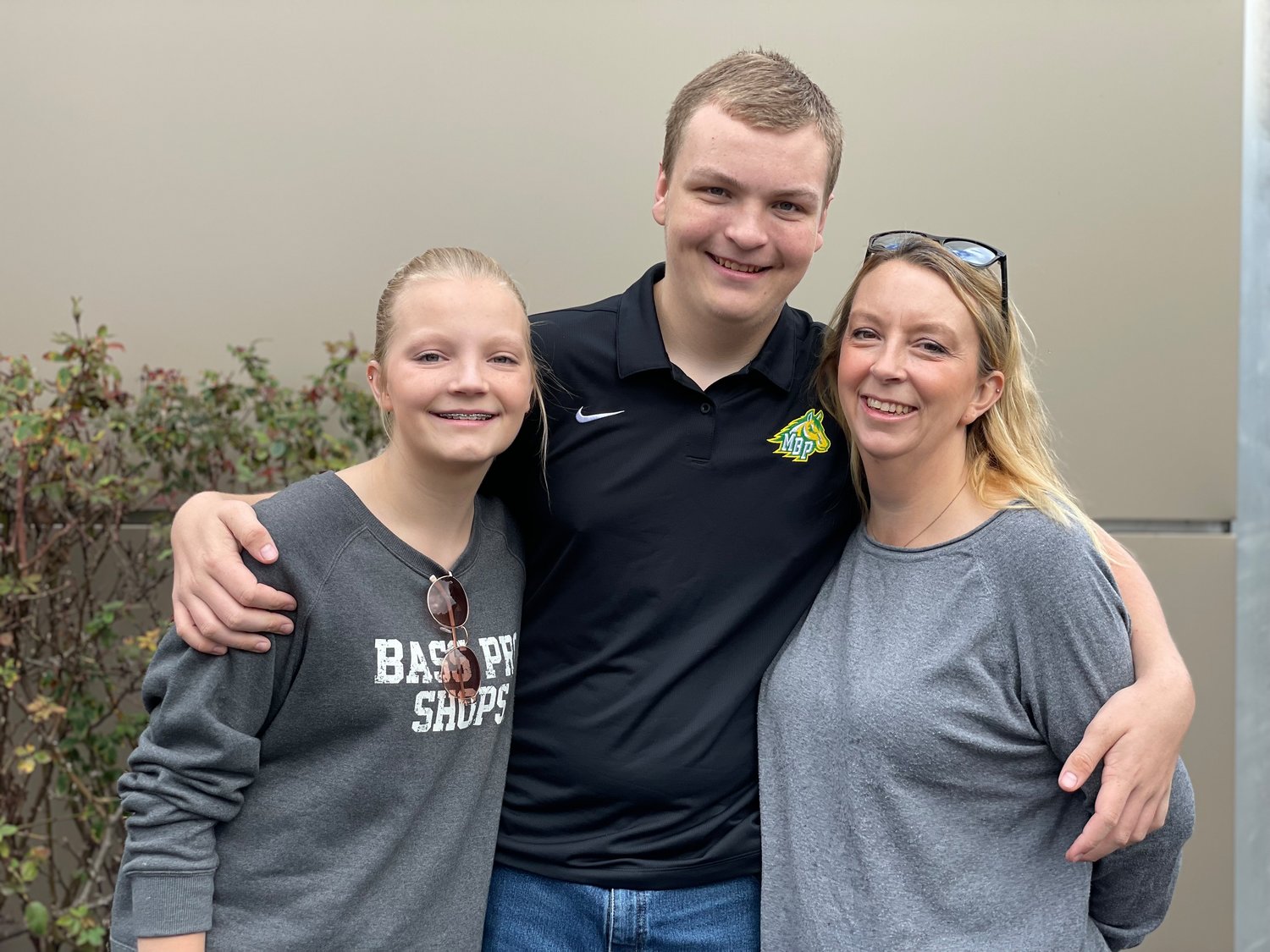 Three members of the Allred family — Kaley (left), Nathan (center) and Kristie (right) — work in Chatham County Schools Nutritional Services. They all say they enjoy putting a smile on kids faces as they walk through the cafeteria.