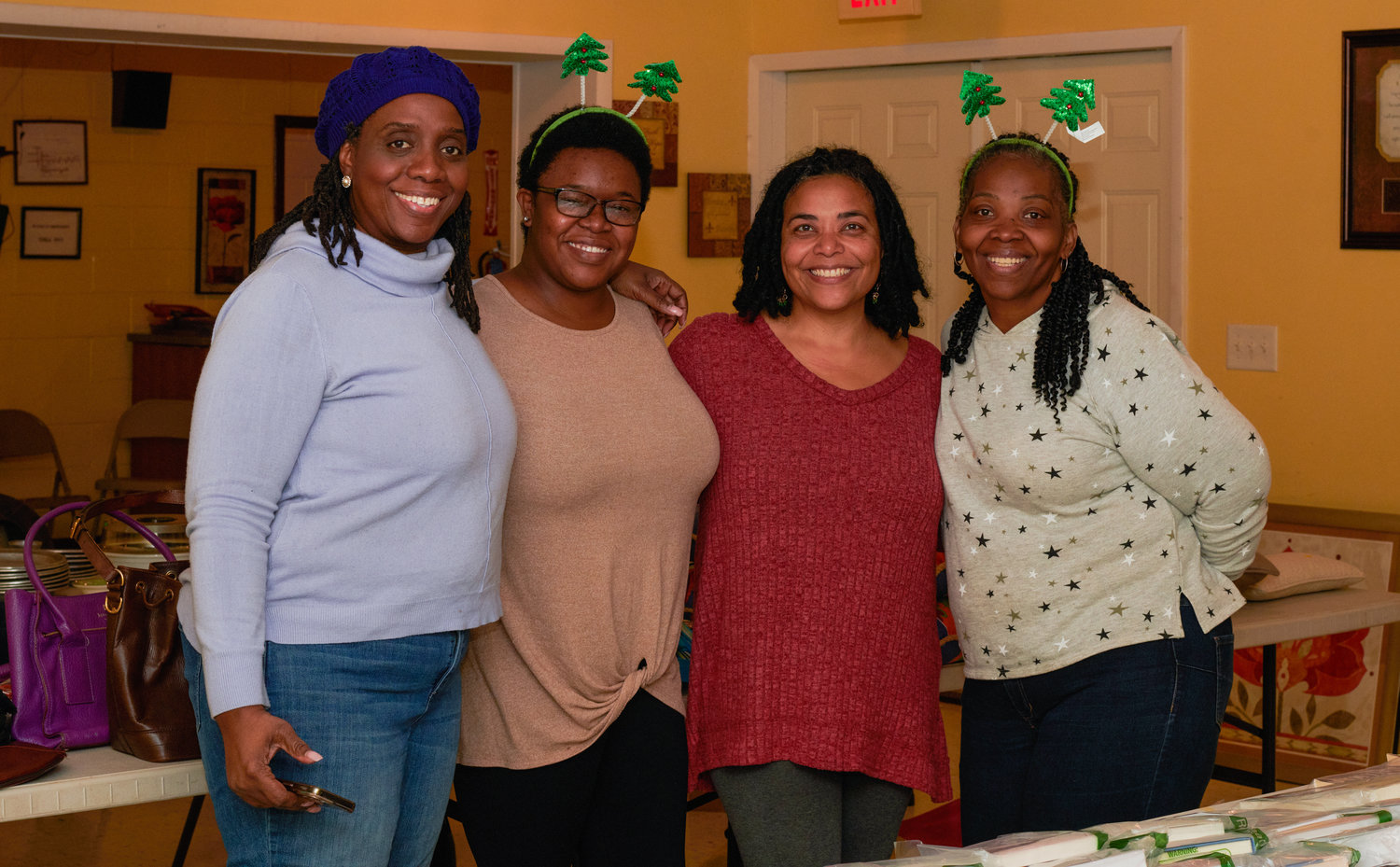 Members of Community Organizing for Racial Equity (CORE) and Union Taylors Community Center helped to direct individuals at the fundraiser at Taylors Chapel Missionary Baptist Church. Pictured here left to right: Stephanie Terry, Michelle Wright, Karinda Roebuck and Samantha Goldston.
