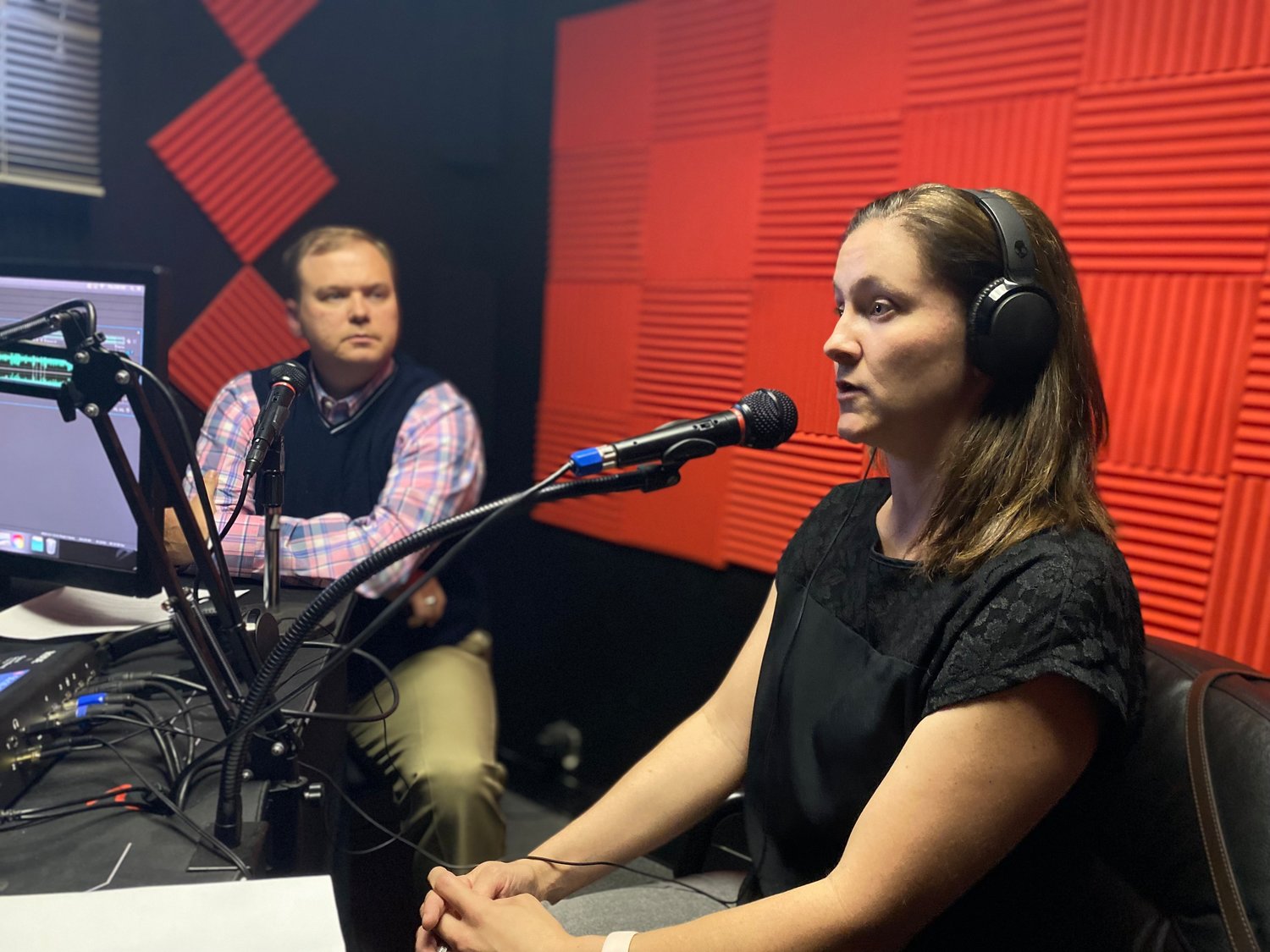 The United Way's Katie Childs, shown during a News + Record 'Chatcast' podcast recording. The Chatcast is co-hosted by Daniel Simmons of the Boys & Girls Clubs (shown, left) and CN+R Publisher Bill Horner III.